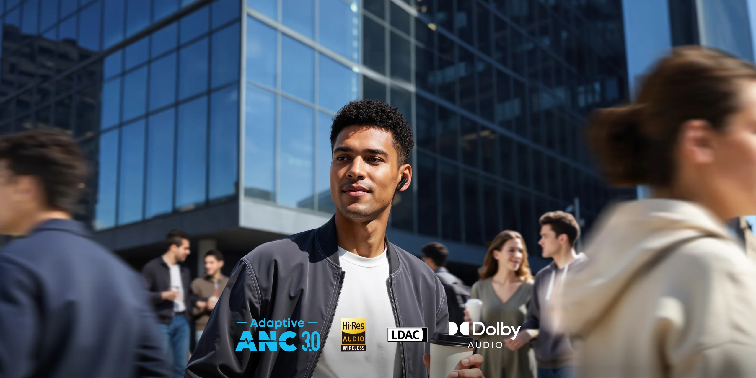 Person standing in front of a modern building with audio branding overlays.