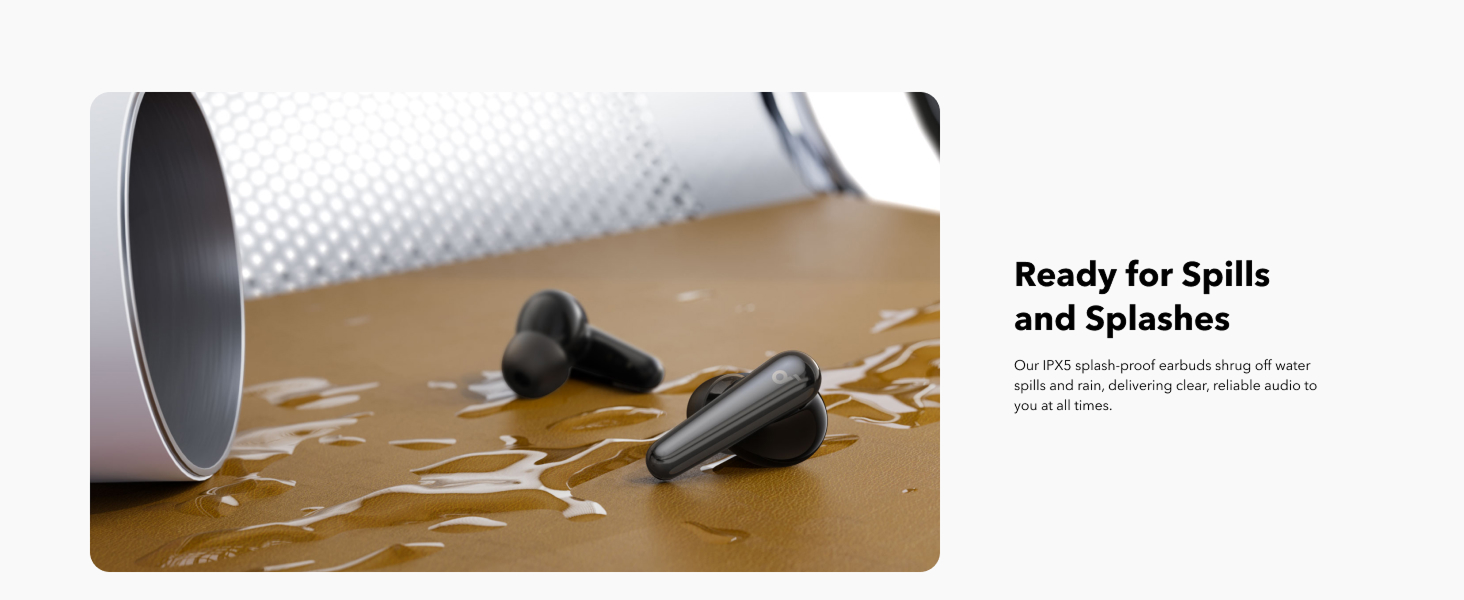 Black wireless earbuds are lying on a brown, water-splashed surface, next to an overturned white container. The text "Ready for Spills and Splashes" is next to the image, with a description of the earbuds' IPX5 splash-proof rating.