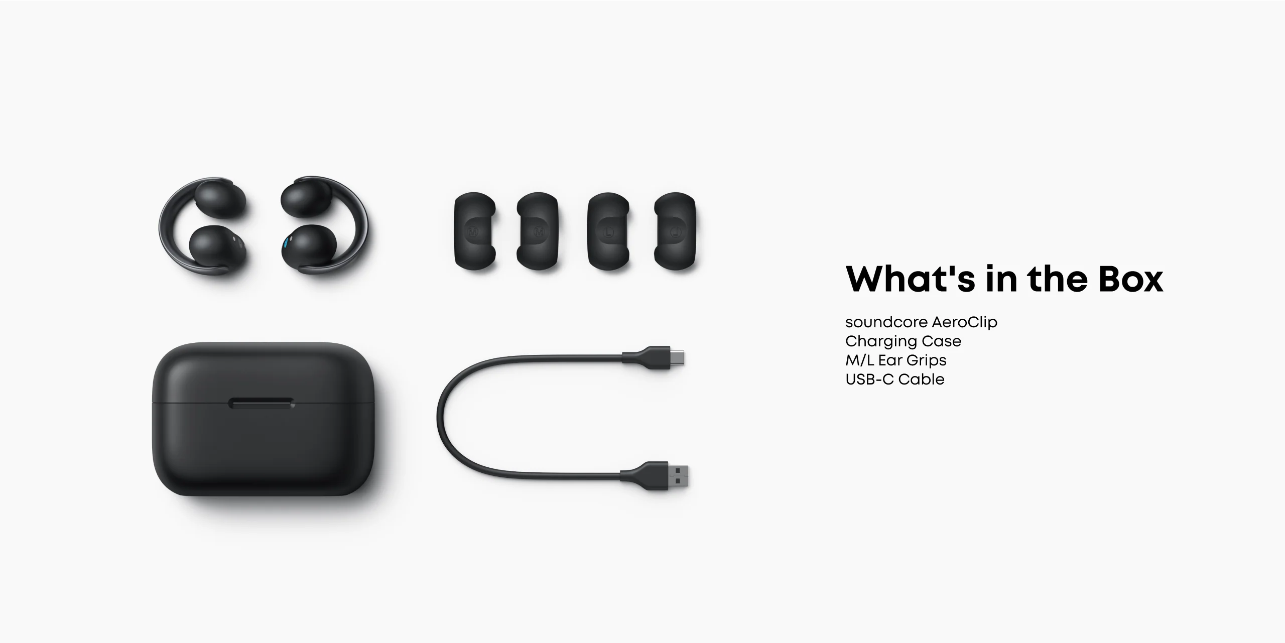 Box contents including wireless earbuds, charging case, and cable on a white background